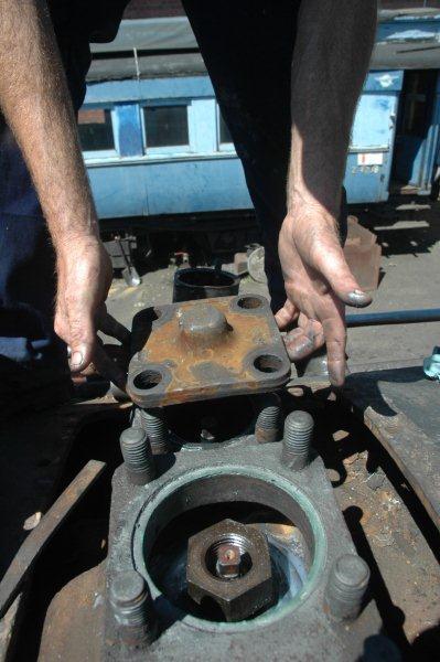 Carefully placing the cover in position