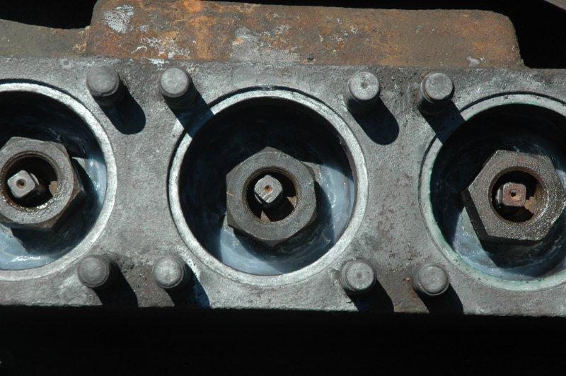 Sealed up with a silicon, the valves in the regulator header can be seen. The reason for the silicon is that the boiler is undergoing its hydraulic pressure testing.