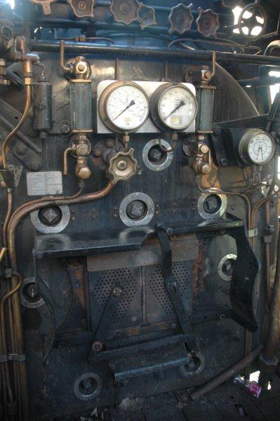 At last the cab interior is complete. Robert Dadford fitted the guage column cocks after removing the blanks from the hydraulic test. John Dadford, Spikkels and Nathan fitted the firehole doors.