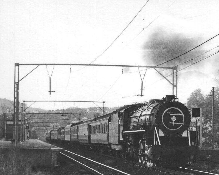 Early evening at Loftus Verseveld halt and the clean Capital Park 15CA hauls the passenger towards Witbank in 1971.