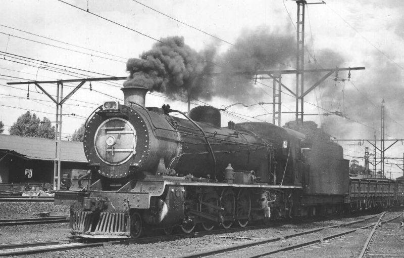 On the shunt in Witbank yard, this 15AR lays a smokey trail. Witbank had an &quot;S&quot; class as well but mostly there were 15CA and CB. 1970
