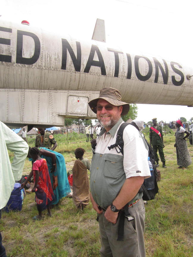 Me standing next to a helicopter in Waat, Pieri or Pibor (can't remember which) in November or December 2011.