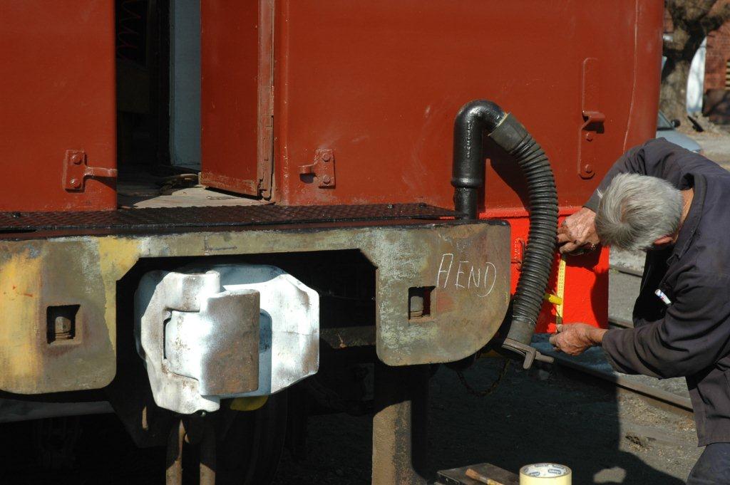John measuring up so that the coupler heights can be marked.