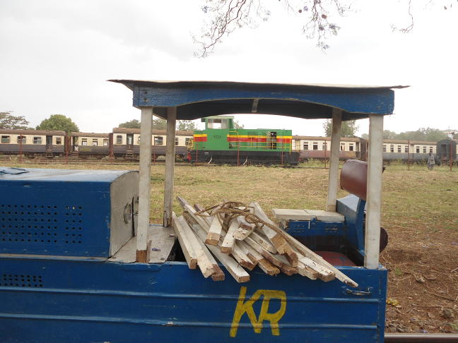 A view through the cab of the miniature loco. The wood piled in the cab is the result of renovations to the mini-train, not for firelighting...