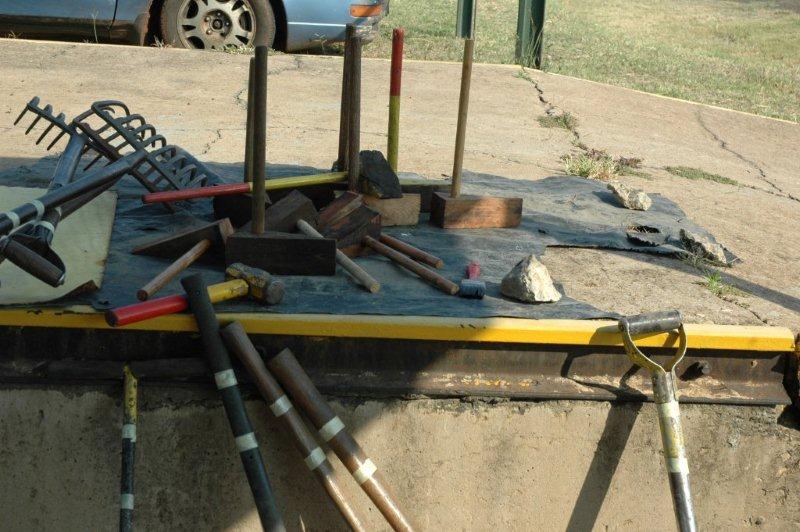 The tools masked and ready for painting as are newly made wooden scotches for placing on each coach in its specially prepared holder!