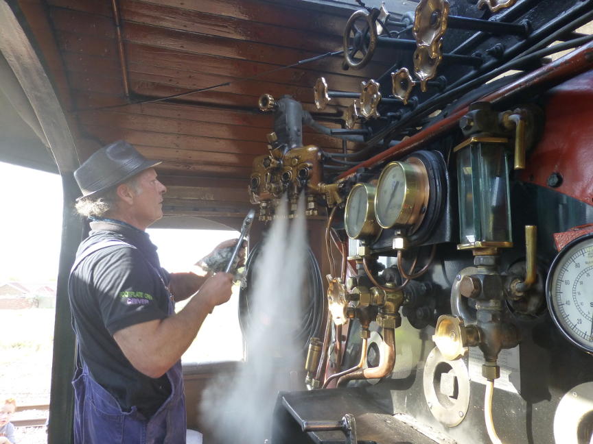 Steam blows through, cleaning the lubricator