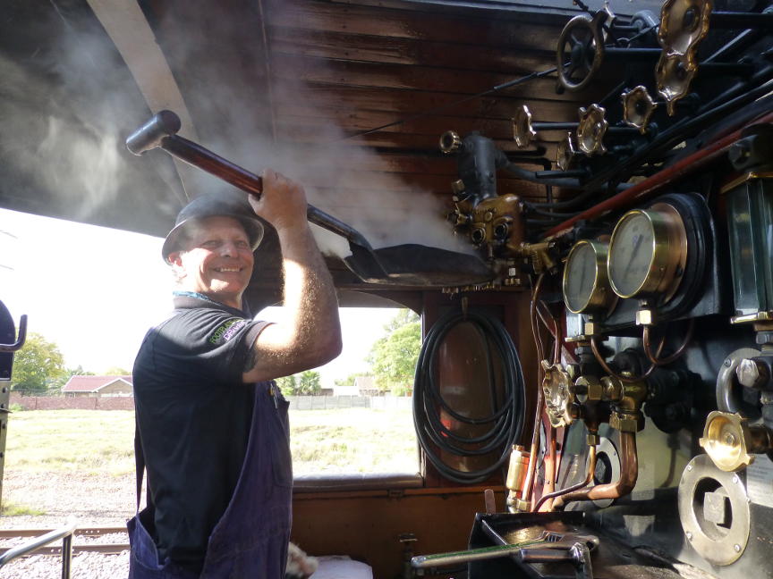 Nathan cleans the lubricator. The shovel is used to catch dripping oil