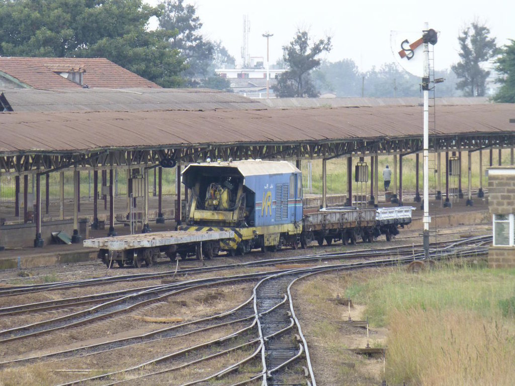 A track machine stands by the station