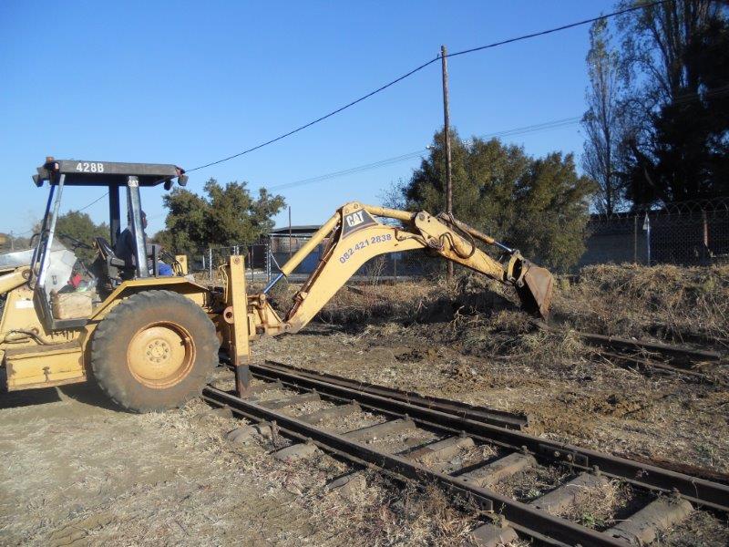 Unearthing track from the embankment.