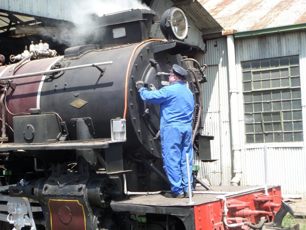 FOTR's John Ashworth tightens the smokebox door after lighting 3020 for the first time in two years