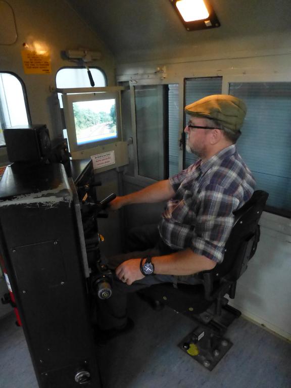 John &quot;drives&quot; the diesel locomotive &quot;simulator&quot; in the museum. It's not really a simulator, more of a demonstrator really.