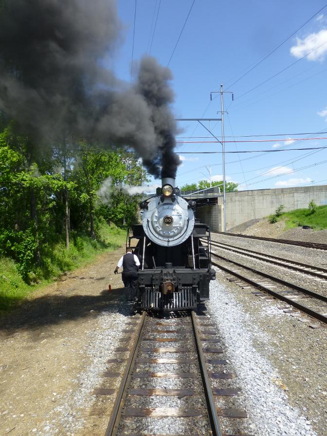The loco has uncoupled to run round at the end of the line.