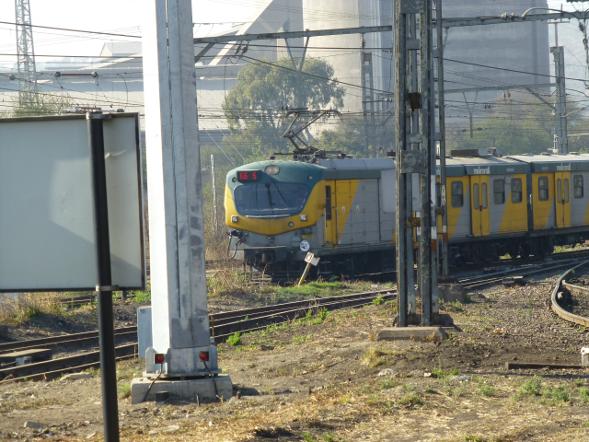 Several Metro sets pass while we wait