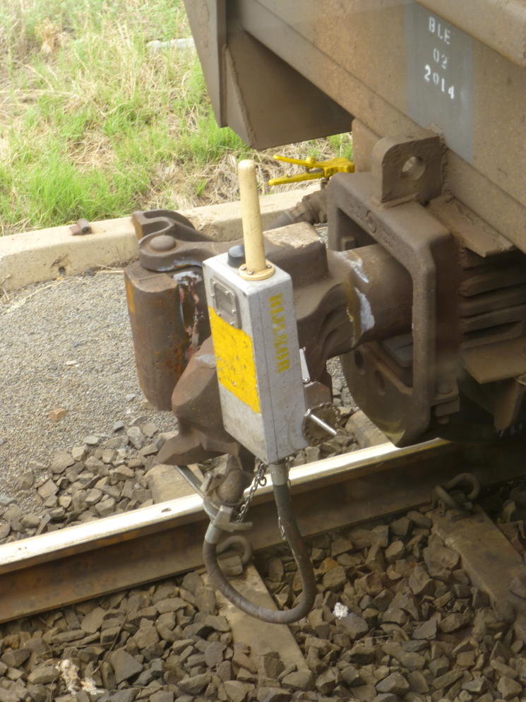The air brake monitoring device on the rear of a parked train can be seen clearly here.