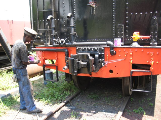 Nataniel paints the buffer beam<br /><br />Photo by John Ashworth 24/02/08