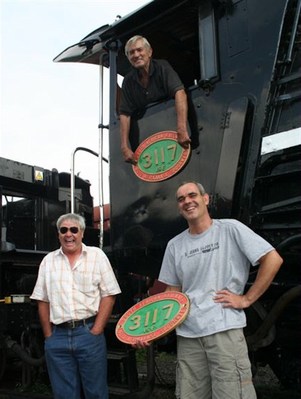 The donators of the numberplates stand with John and the loco<br /><br />C Janisch