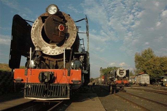 New and the old. 3117 the 15F starts to look like a complete locomotive. In the background, stands stalwart 15F 3094, who has been an "organ donor" to her sister, in order for the Spirit of Steam to survive.