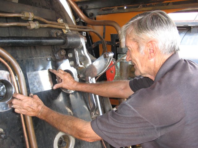 Uncle John decides where to fix the plate