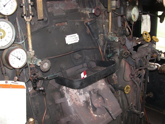 Whils we here pride ourselves on the clean cabs of our preserved locomotives, this is not always the case elsewhere. Class 141R ex SNCF preserved locomotive footplate as seen from the driver's side. It is an oil burner.