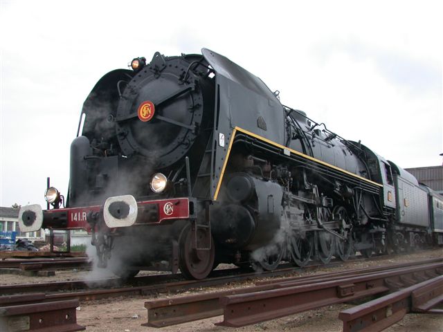 "Les Americanes" - magnificent oil burning 141R locomotive built by the Americans and sent to France after WW2. A splendid loco preserved and seen here preparing for a special