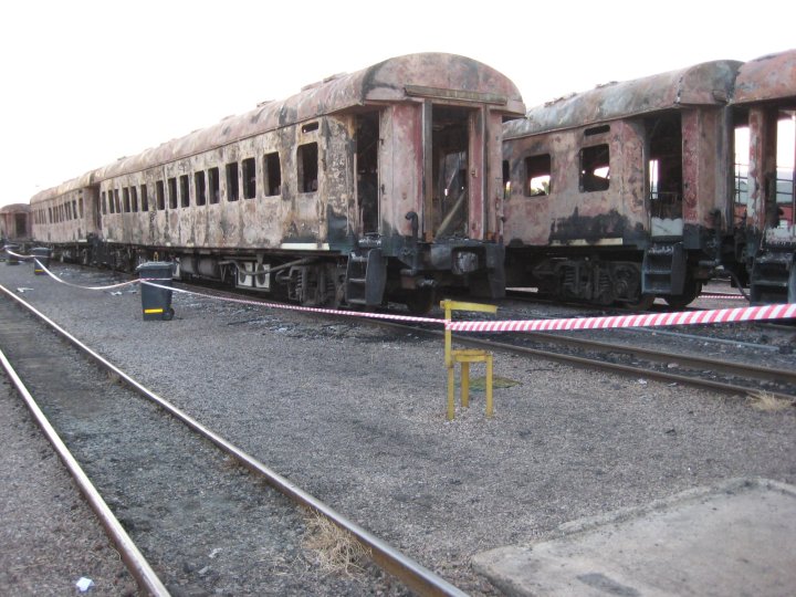This picture shows how two trains standing next to each other were both burned