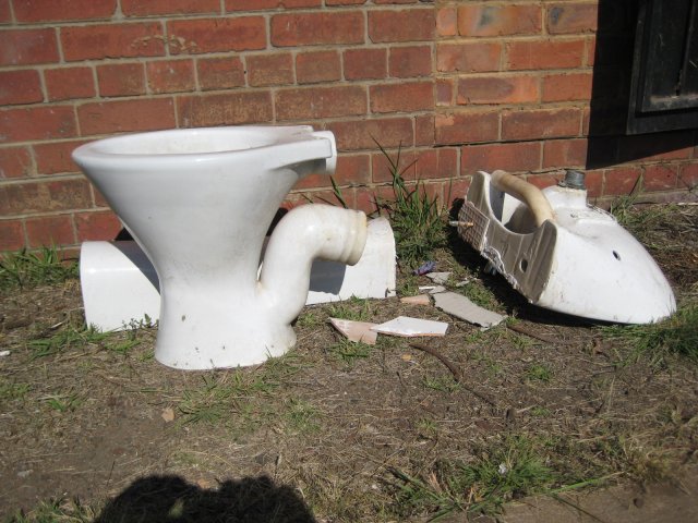 Donated toilet bowl and wash basin ready to be installed