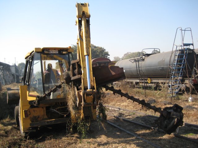 A new hedge-cutting implement fitted to a tractor...