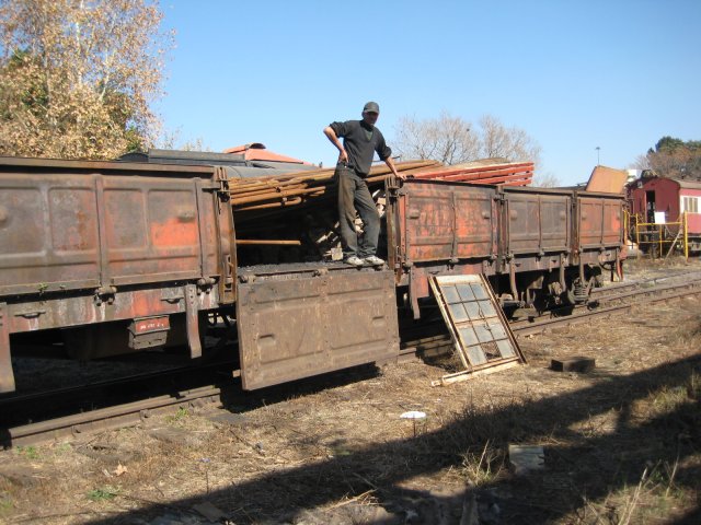 Frank surveys his kingdom from the top of the NZ wagon, which is standing by the coal stage for loading with scrap metal