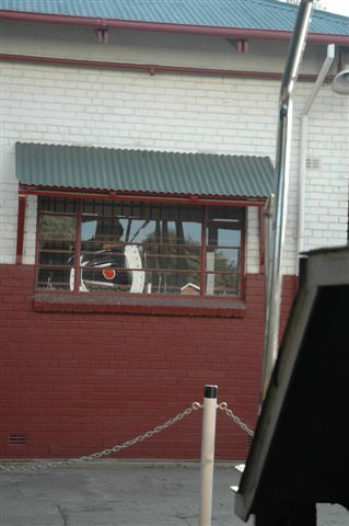 Looking forlornly through the window, we see a sick Dolly that wants to go out and play with her sister, whose handrails we see in the foreground!! However, it is but a mere reflection of herself!