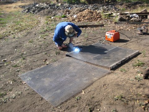 Koosie welds the sieve together
