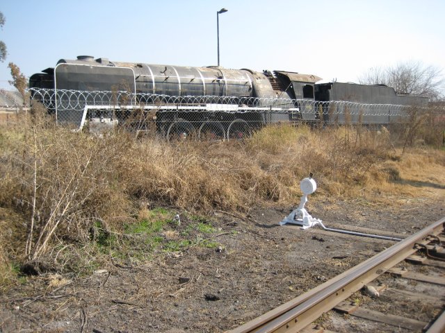 3094 looking a bit sad behind the fence