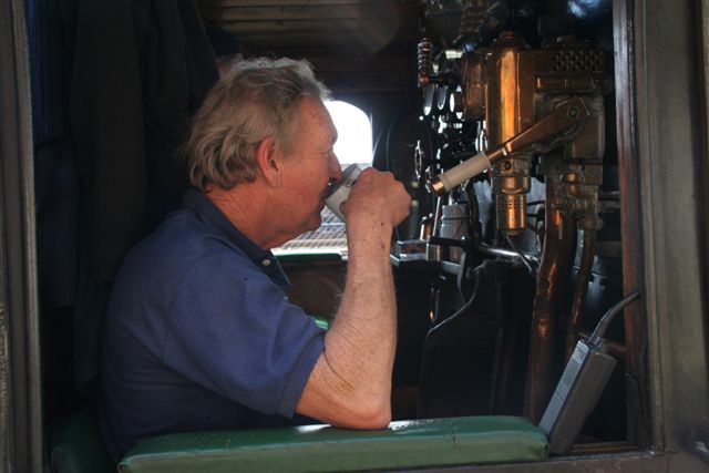 Cliff sips pensively while awaiting the right-away.