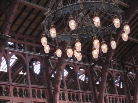 Chandelier and wooden roof in booking hall