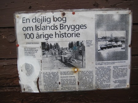 Newspaper article displayed on the side of the wagon