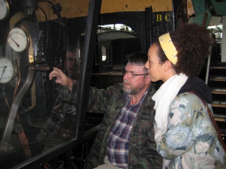 John teaches 13 year old Nini to drive a Danish steam engine