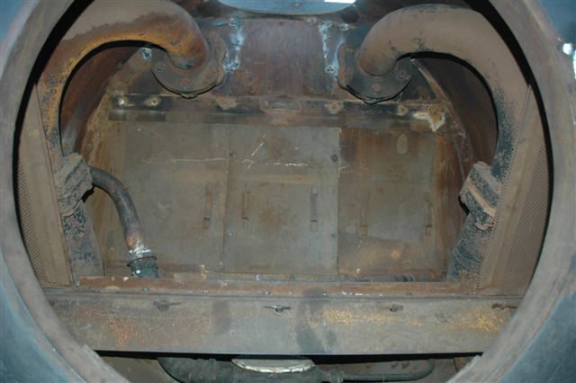 A better view of the smokebox chamber framed by the door space. Petticoat and chimney have been removed to effect welding repairs to close spark emitting gaps