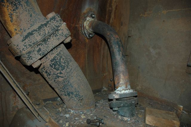 The branch steam pipe on the driver's side in the smokebox of 15F 3117. There was damage to the flange, which was cracked, and a small pin hole in the pipe itself
