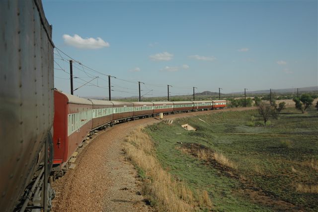 The balloon at Pyramid South. The train is at its furthest point and now returns to Pretoria, viewed towards the mountains in the background