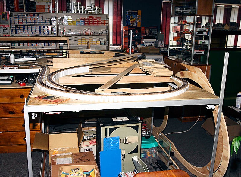 Photo 2 - The work area with the cut risers stacked on the right of the table.