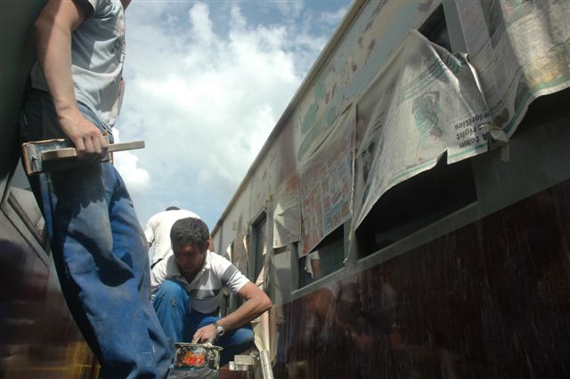 The private contractors at work on spraying our coaches