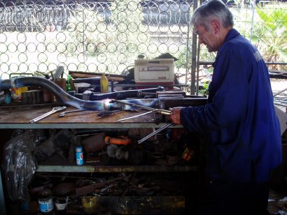 Uncle John heats the pipe<br /><br />Photo by John Ashworth 13/10/07