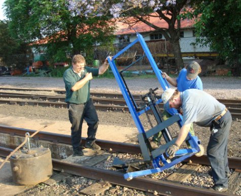 Gabor, Nathan and John manoeuvre the tool across the track, having taken off the vacuum cylinder (bottom left)<br /><br />Photo by Tom Macrery 13/10/07