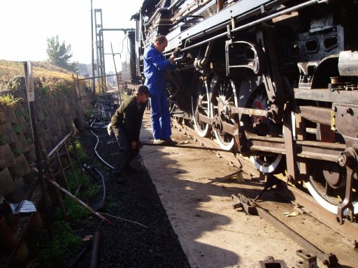It's much cheaper to move a locomotive by hand than to spend good money on coal. Adrian pinches the loco backwards to Robert's hand signals<br /><br />Photo by John Ashworth 07/07/07