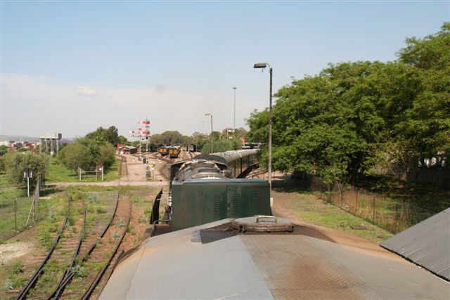Aerial view from 3484's cab roof, with 3442 and a long train behind in the Rovos yard.