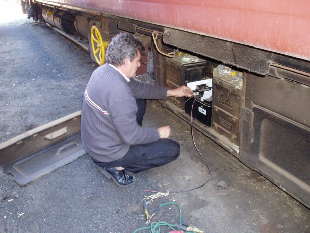 Steve S examining the external batteries<br /><br />Photo by John Ashworth 08/07/07