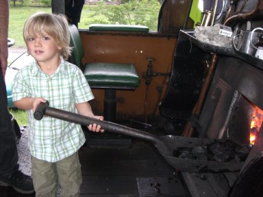 Jane and John's great-nephew stokes the fire on 2650 - using child labour is much cheaper than paying real firemen...