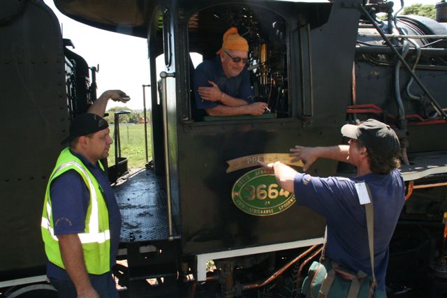 Trainman conveys instructions to Cliff and Gabor, who look mildly impressed!