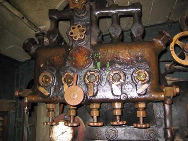 This lubricator appears to have two filler caps and two drains.