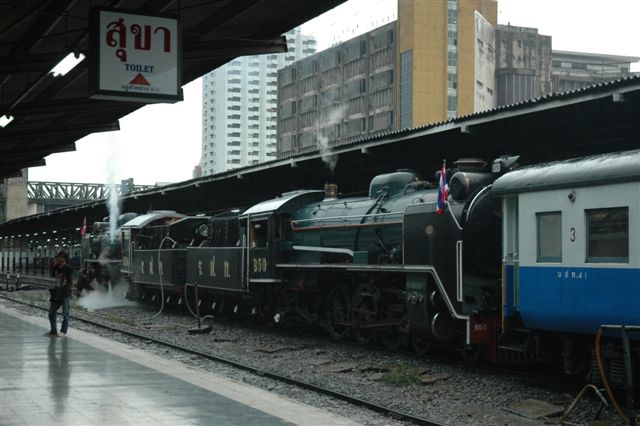 The double header tops up at Bangkok station.