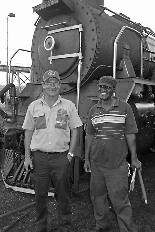Driver Daantjie and Trainee BZ share a joke before signing off
